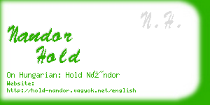 nandor hold business card